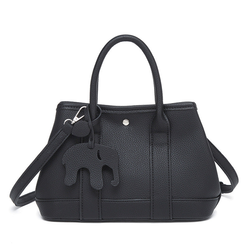 Damen Handtasche mit abnehmbarem Elefantenanhänger und elegantem Kunstleder Nord Taschen