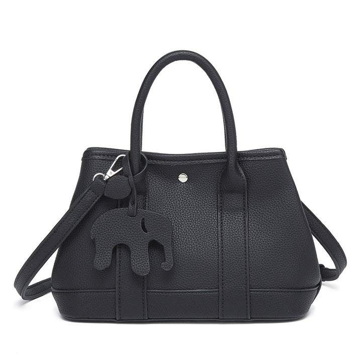 Damen Handtasche mit abnehmbarem Elefantenanhänger und elegantem Kunstleder Nord Taschen