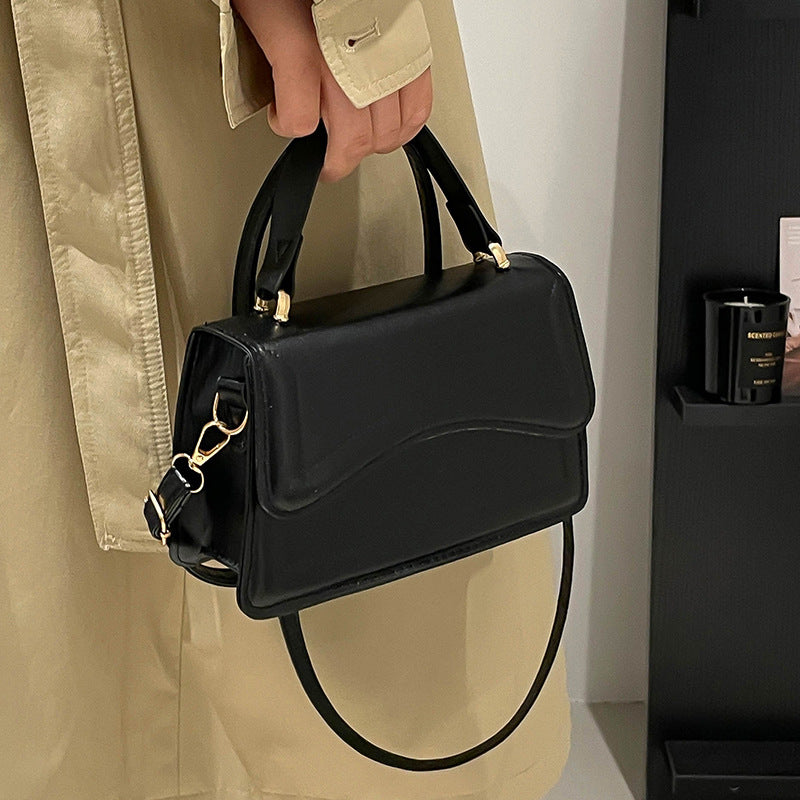 Damen elegante Handtasche mit geschwungenem Design Nord Taschen