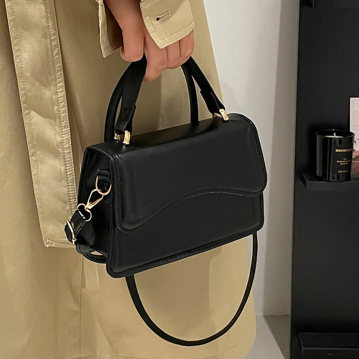Damen elegante Handtasche mit geschwungenem Design Nord Taschen