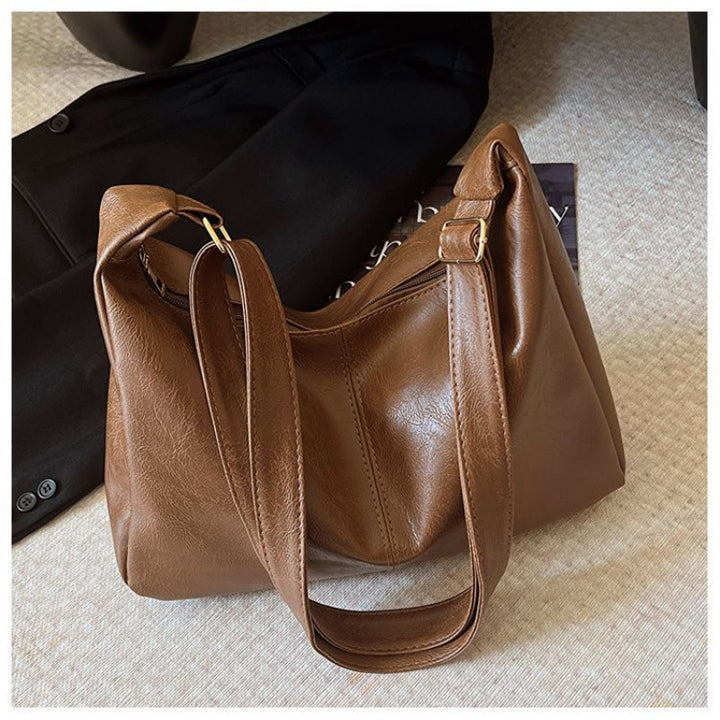 Damen Hobo-Handtasche mit weichem Kunstleder und elegantem Tragegurt Nord Taschen