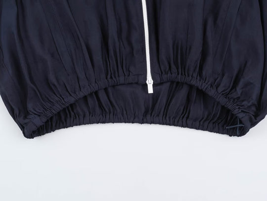 Damen Cropped Windbreaker-Jacke mit hohem Funnelkragen, Kontrastpaspel und elastischem Saum Nord Taschen