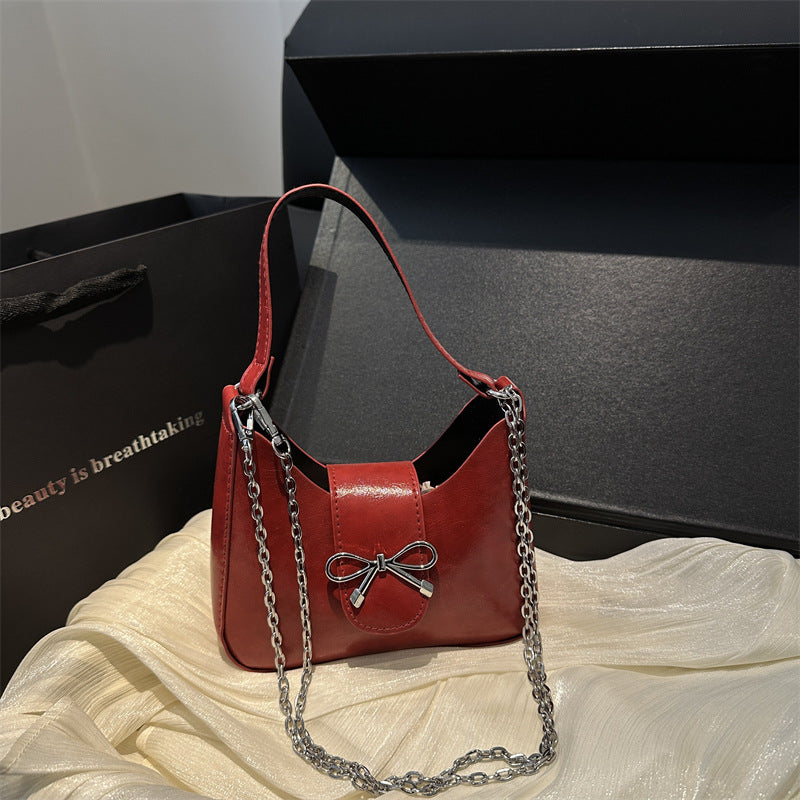Damen-Handtasche mit verspieltem Schleifendetail und hochwertiger Kettenverzierung Nord Taschen