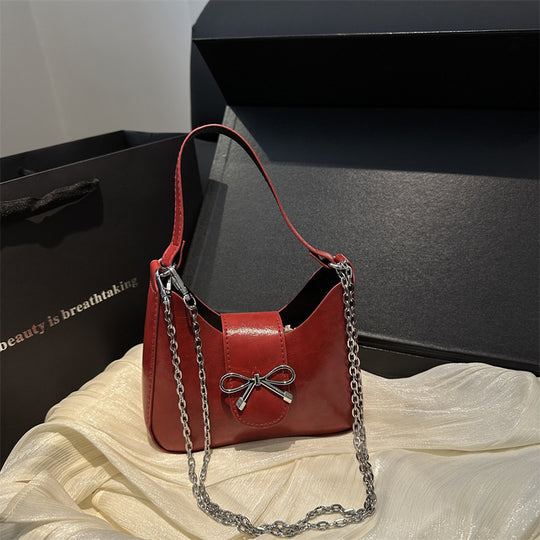 Damen-Handtasche mit verspieltem Schleifendetail und hochwertiger Kettenverzierung Nord Taschen