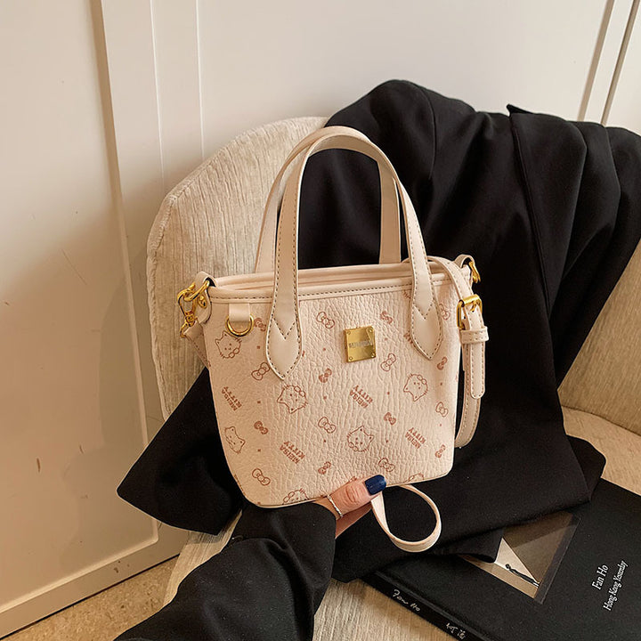 Damen Mini-Handtasche im entzückenden Design mit abnehmbarem Anhänger | Nord Taschen