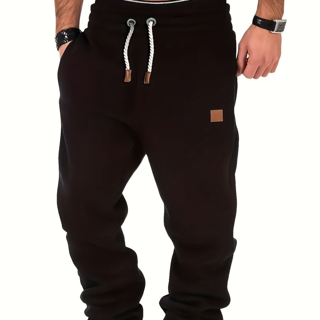 Herren melierter Relax-Jogger mit breitem Komfortbund, gedrehtem Kordelzug und gerippten Knöchelabschlüssen Nord Taschen
