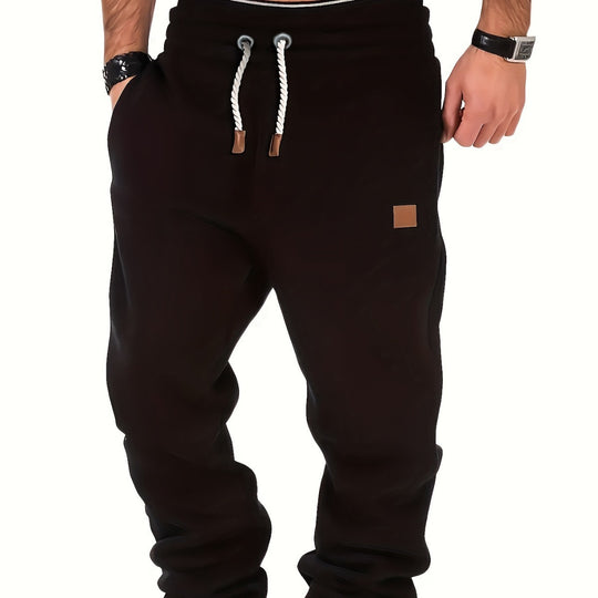 Herren melierter Relax-Jogger mit breitem Komfortbund, gedrehtem Kordelzug und gerippten Knöchelabschlüssen Nord Taschen