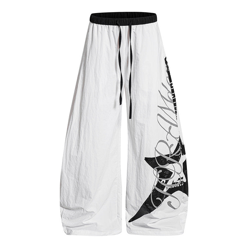 Damen Weite Palazzo-Hose mit Tunnelzugbund und großflächigem Statement-Print Nord Taschen