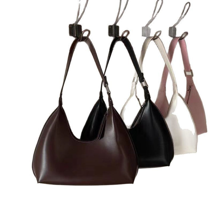 Damen Hobo-Tasche mit elegantem, geschwungenem Design und schickem Kettenakzent Nord Taschen