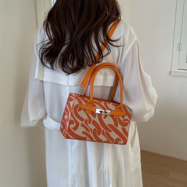 Damen Designer Handtasche mit verspieltem Kettenmuster Nord Taschen