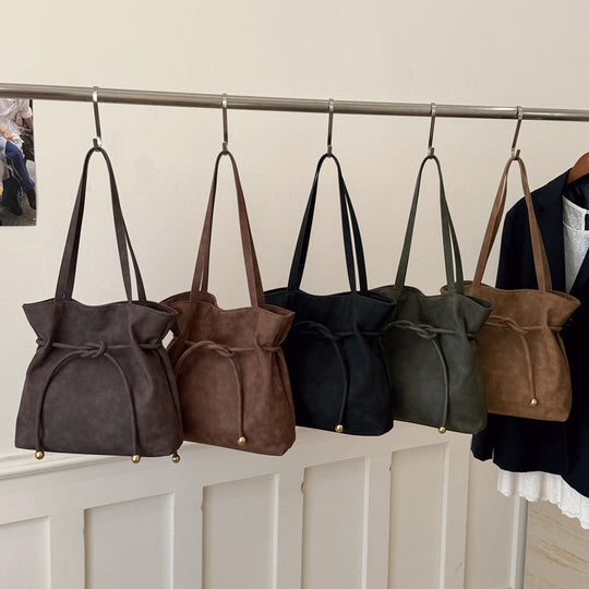 Damen Hobo-Tasche aus weichem Kunstleder mit praktischem Kordelzug Nord Taschen