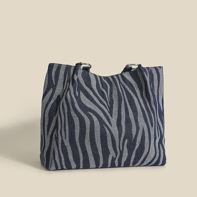 Damen Tote-Tasche mit stylischem Zebra-Muster und elegantem Kettenakzent Nord Taschen