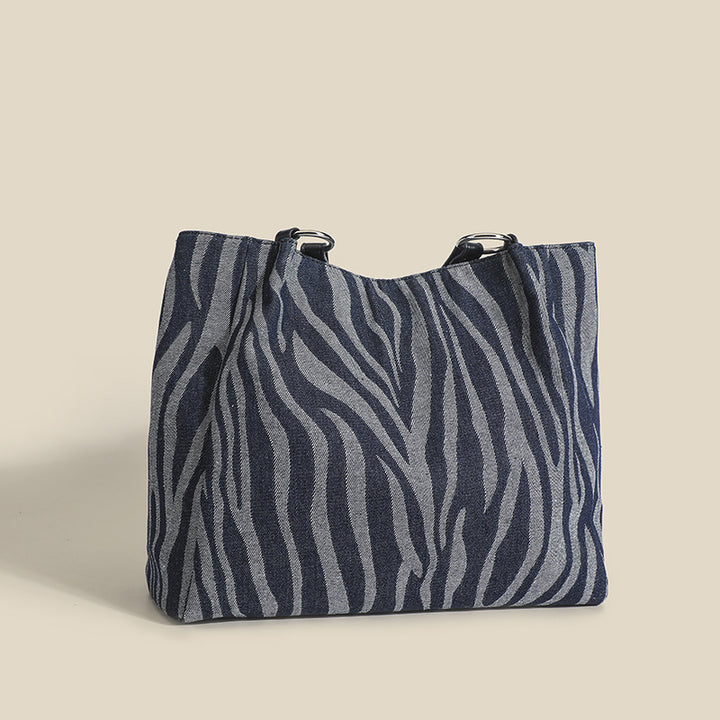 Damen Tote-Tasche mit stylischem Zebra-Muster und elegantem Kettenakzent Nord Taschen
