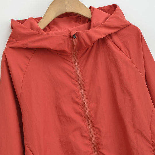 Damen Ultraleichte Kapuzen-Windbreaker mit verlängertem Rückensaum und elastischem Saum Nord Taschen