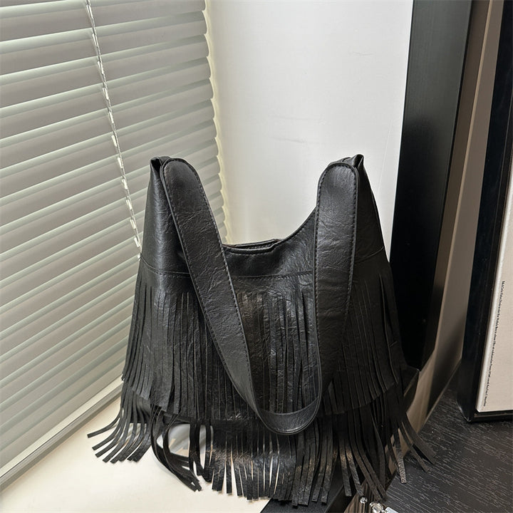 Damen Umhängetasche mit fransigem Design und robustem Tragegriff Nord Taschen