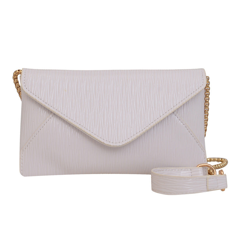 Damen Clutch mit elegantem Wellenmuster Nord Taschen