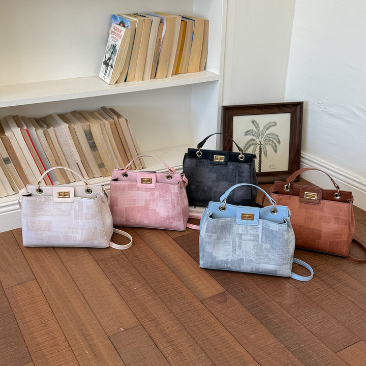 Damen elegante Umhängetasche mit luxuriösem Lederlook und geschmackvollem Verschluss Nord Taschen