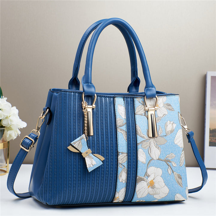 Damen elegante Handtasche mit floralen Akzenten Nord Taschen