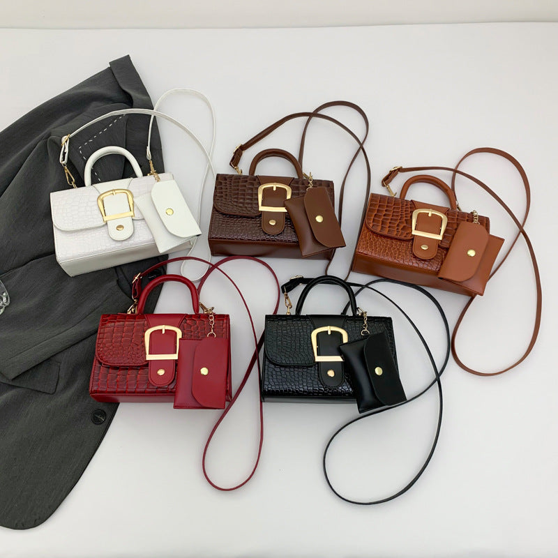 Damen Umhängetasche aus strukturiertem Krokodilleder mit eleganter Schnallenverzierung Nord Taschen