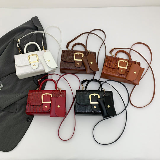 Damen Umhängetasche aus strukturiertem Krokodilleder mit eleganter Schnallenverzierung Nord Taschen