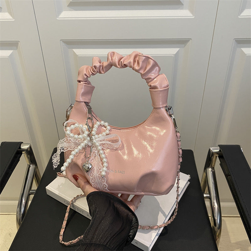 Damen elegante Handtasche mit dekorativen Perlenakzenten Nord Taschen