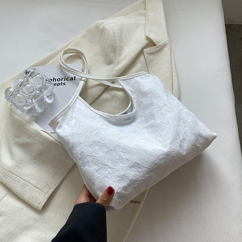 Damen stilvolle Tragetasche mit floralem Strukturdesign Nord Taschen