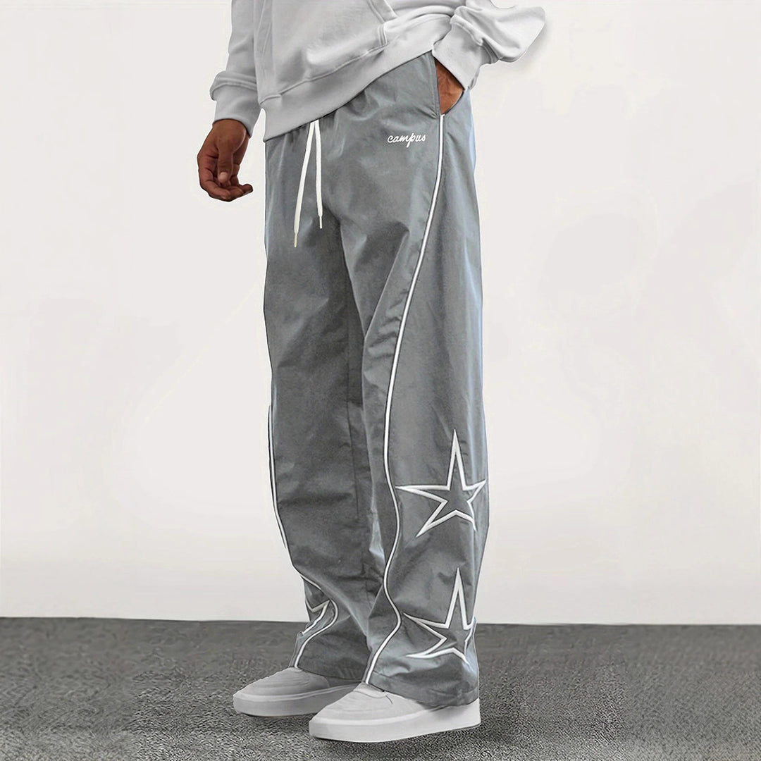 Herren Weite Trackpants mit Kontrastpaspel, Kordelzug und Sternapplikation Nord Taschen