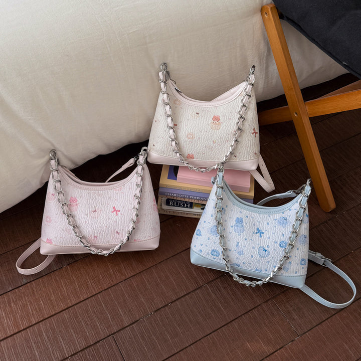 Damen Schultertasche mit verspieltem Design und charmantem Tieranhänger Nord Taschen