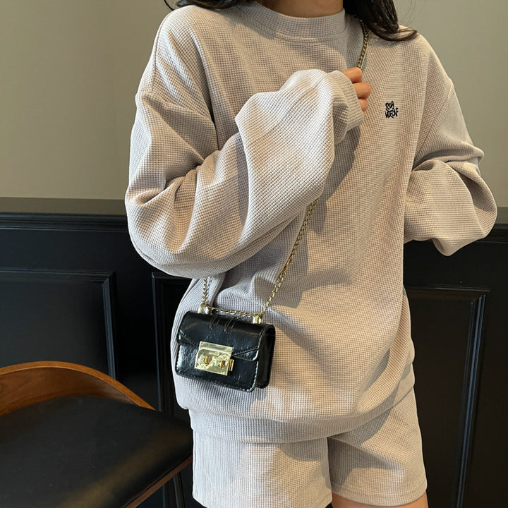 Damen elegante Mini-Handtasche mit goldener Verschlussmechanik Nord Taschen