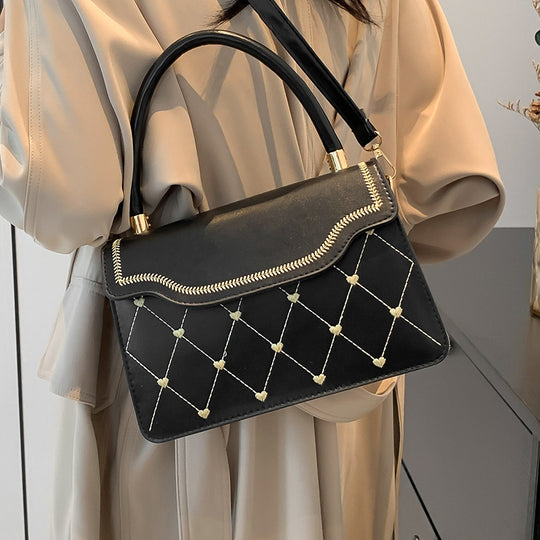Damen elegante Umhängetasche mit stilvollem Steppmuster Nord Taschen