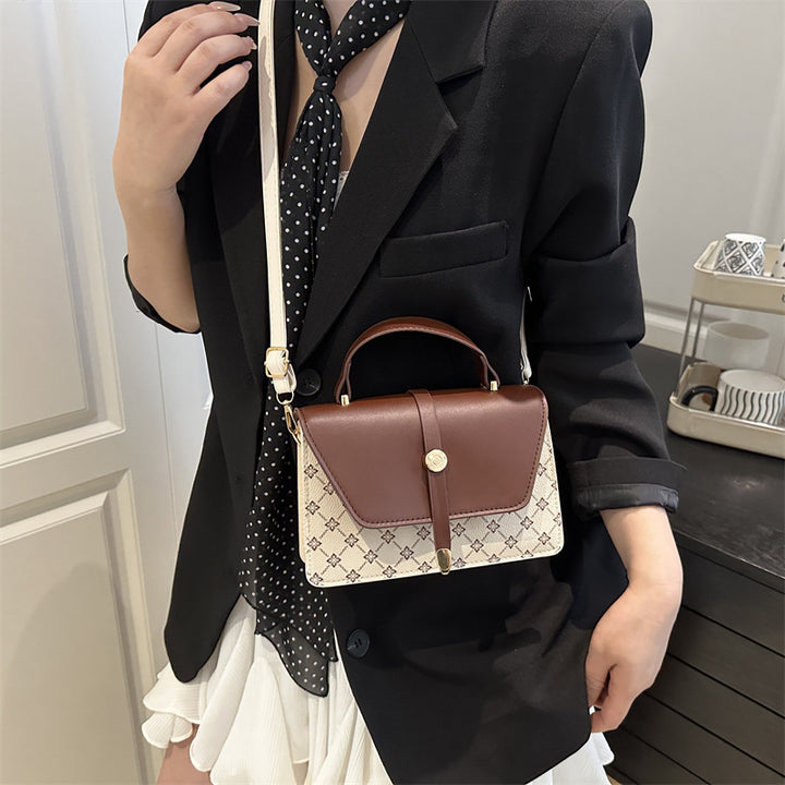 Damen Umhängetasche mit modernem Klappenverschluss und praktischem Handgriff Nord Taschen