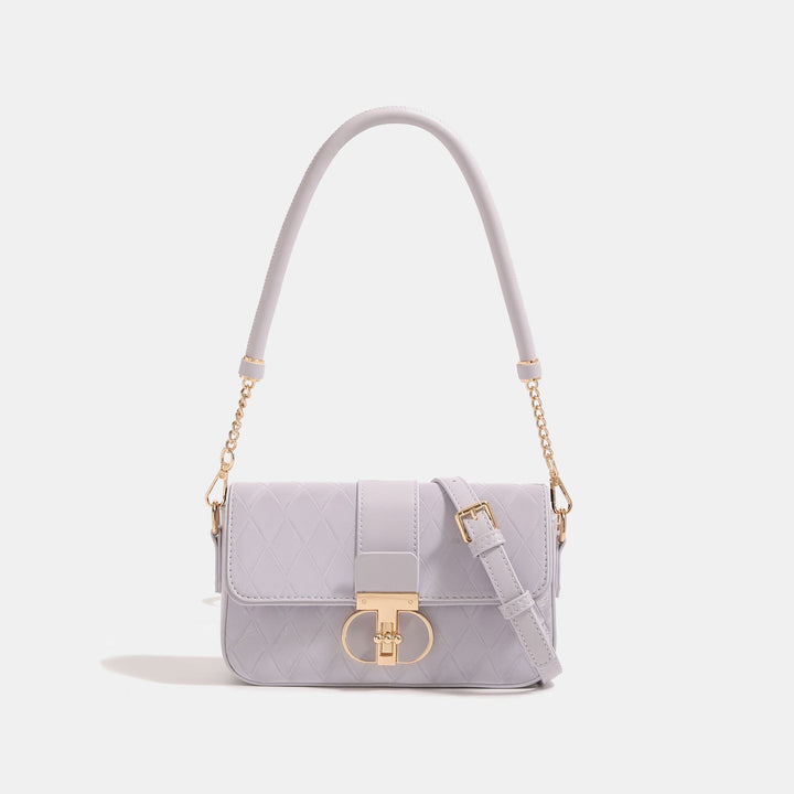 Damen Umhängetasche mit eleganter Steppung und fein gearbeiteten Metallakzenten Nord Taschen