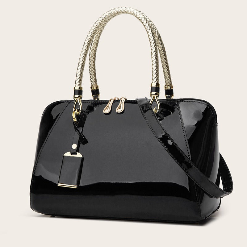 Damen Handtasche mit eleganter Lackoberfläche und geflochtenen Griffen Nord Taschen