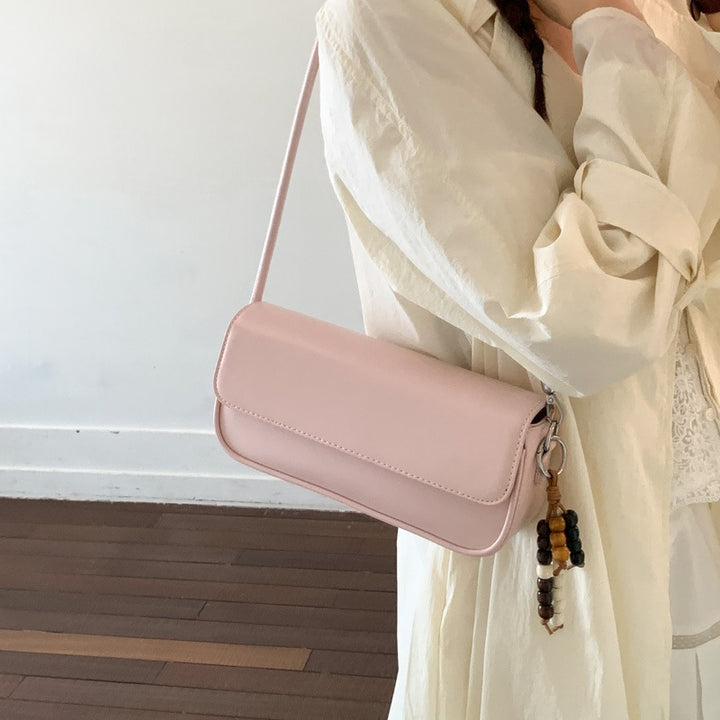 Damen elegante Handtasche mit dekorativem Anhänger Nord Taschen