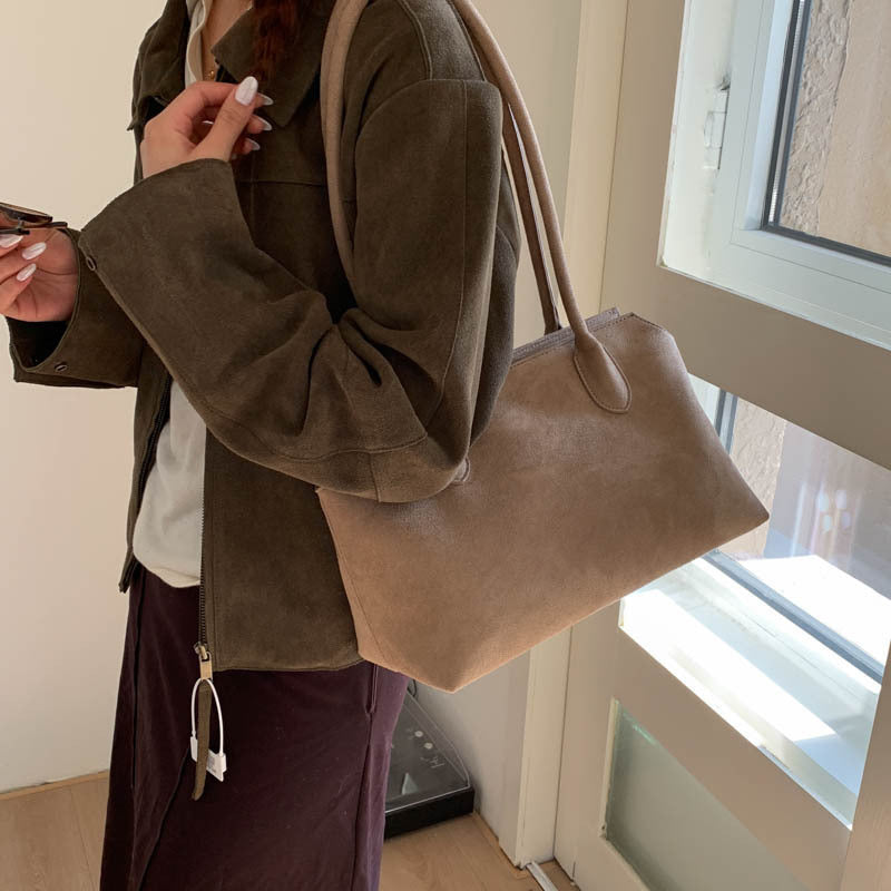 Damen elegante Handtasche aus weichem Kunstleder Nord Taschen