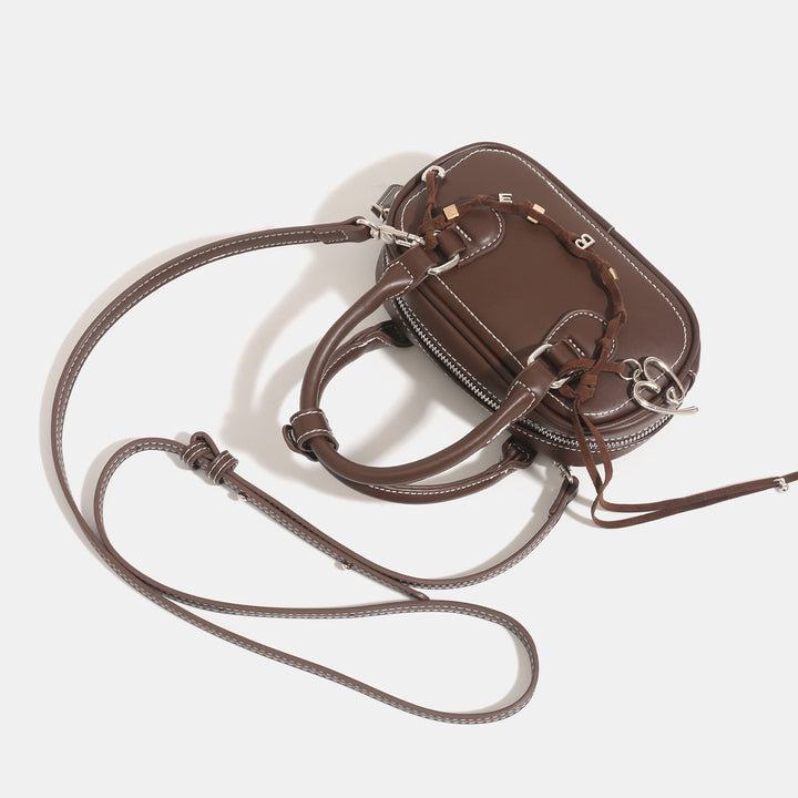 Damen Mini-Handtasche mit verspieltem Kordelzug und eleganten Akzenten Nord Taschen