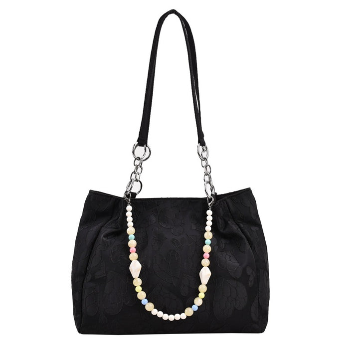 Damen modische Handtasche mit Herzprägung und buntem Anhänger Nord Taschen