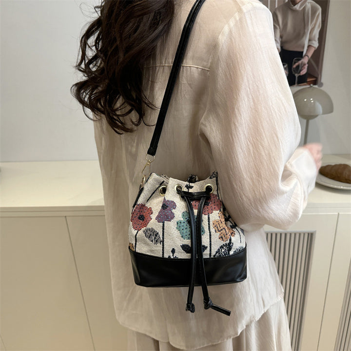 Damen Beuteltasche mit floralem Muster und Lederboden Nord Taschen