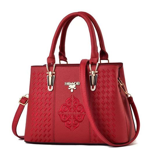 Damen elegante Handtasche mit aufwendigem gewebtem Design und kontrastierender Verzierung Nord Taschen