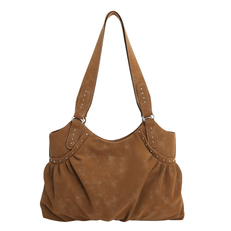 Damen Tasche mit raffiniertem Rüschendesign und Akzenten aus Metall von Nord Taschen