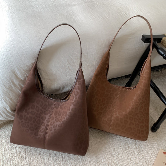 Damen Hobo-Tasche aus hochwertigem Kunstleder mit elegantem Leodruck Nord Taschen