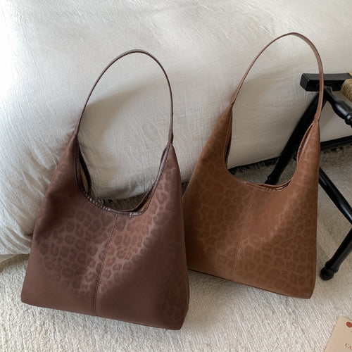 Damen Hobo-Tasche aus hochwertigem Kunstleder mit elegantem Leodruck Nord Taschen