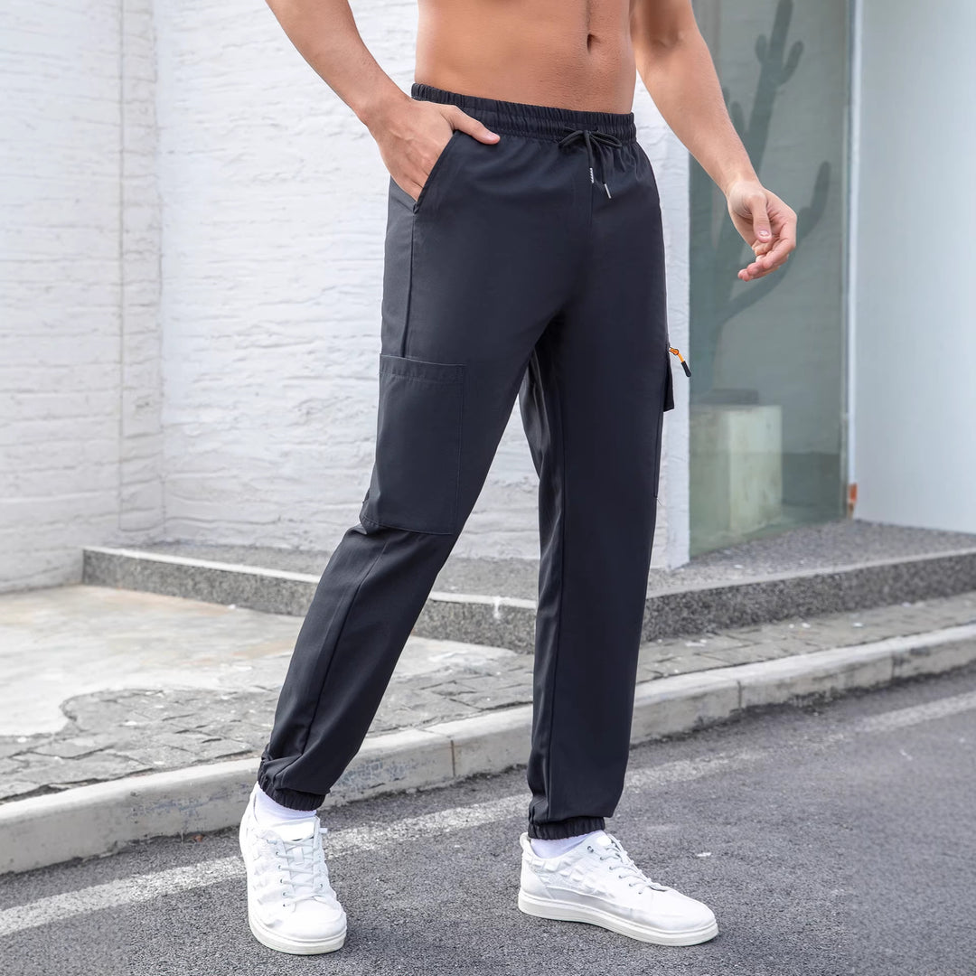 Herren Tech-Cargo-Jogginghose mit elastischem Tunnelzug, Reißverschluss‑Beintasche & eng anliegendem Fußbündchen Nord Taschen