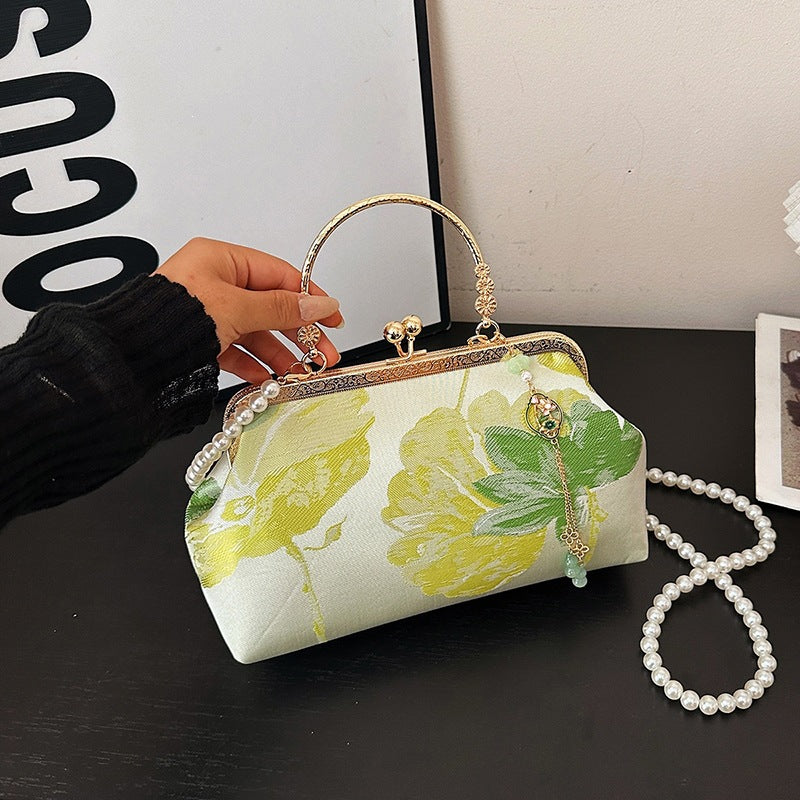 Damen stilvolle Handtasche mit floralen Mustern und Perlenkette Nord Taschen
