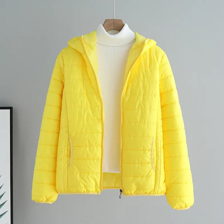 Damen gesteppte Übergangsjacke mit praktischen Taschen und Kapuze