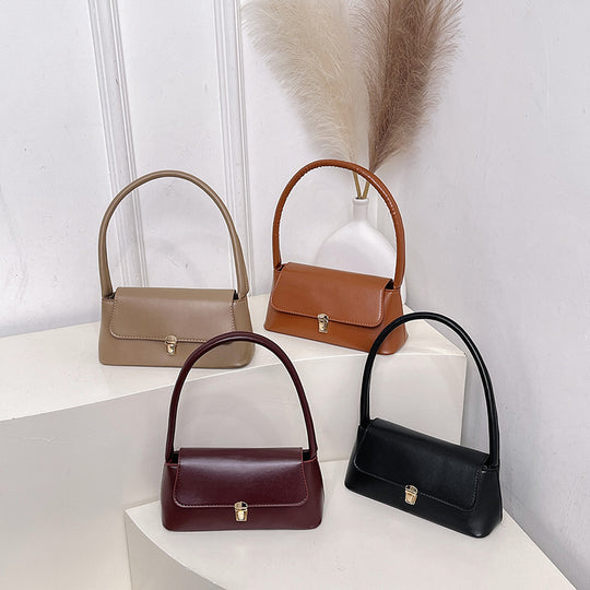 Damen elegante Handtasche mit geschwungenem Henkel Nord Taschen