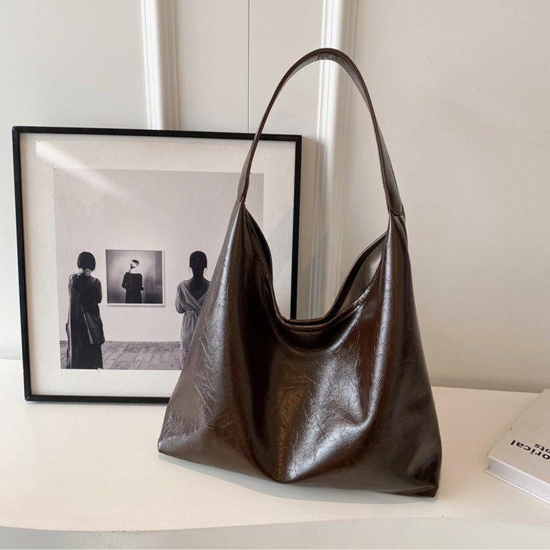 Damen Hobo-Tasche aus weich gewachsenem Kunstleder mit modernem Design Nord Taschen