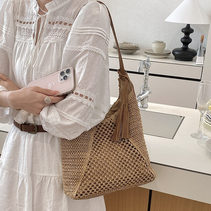 Damen trendige Hobo-Tasche aus handgewebtem Material mit stilvoller Quaste Nord Taschen