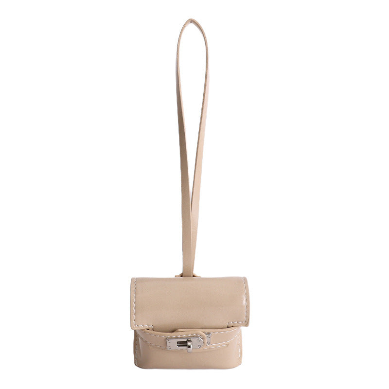 Damen Mini-Handtasche aus hochwertigem Kunstleder mit verspieltem Verschluss Nord Taschen