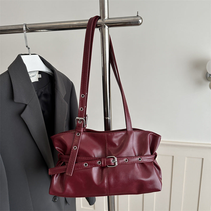 Damen elegante Umhängetasche mit verspieltem Gürteldetail Nord Taschen